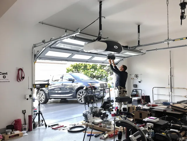 Rincon Garage Door Repair specialist installing smart garage door opener system in Rincon home