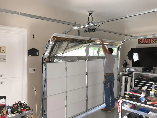 Garage door section replacement by Rincon Garage Door Repair in Rincon
