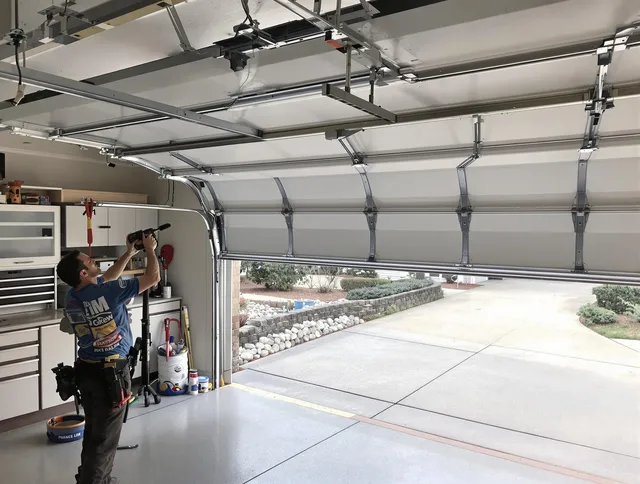 Garage door track repair service by Rincon Garage Door Repair in Rincon